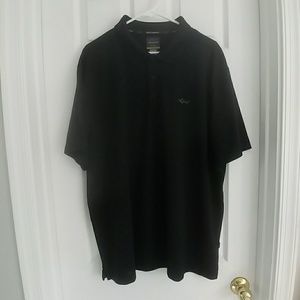 Greg Norman, black polo